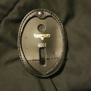 Clip on belt badge holder